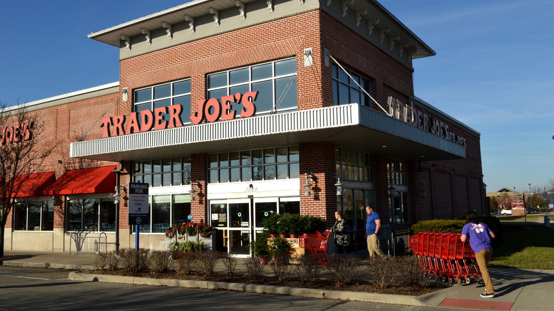 image showing the outside of a trader joe's store - header for does trader joe's deliver post